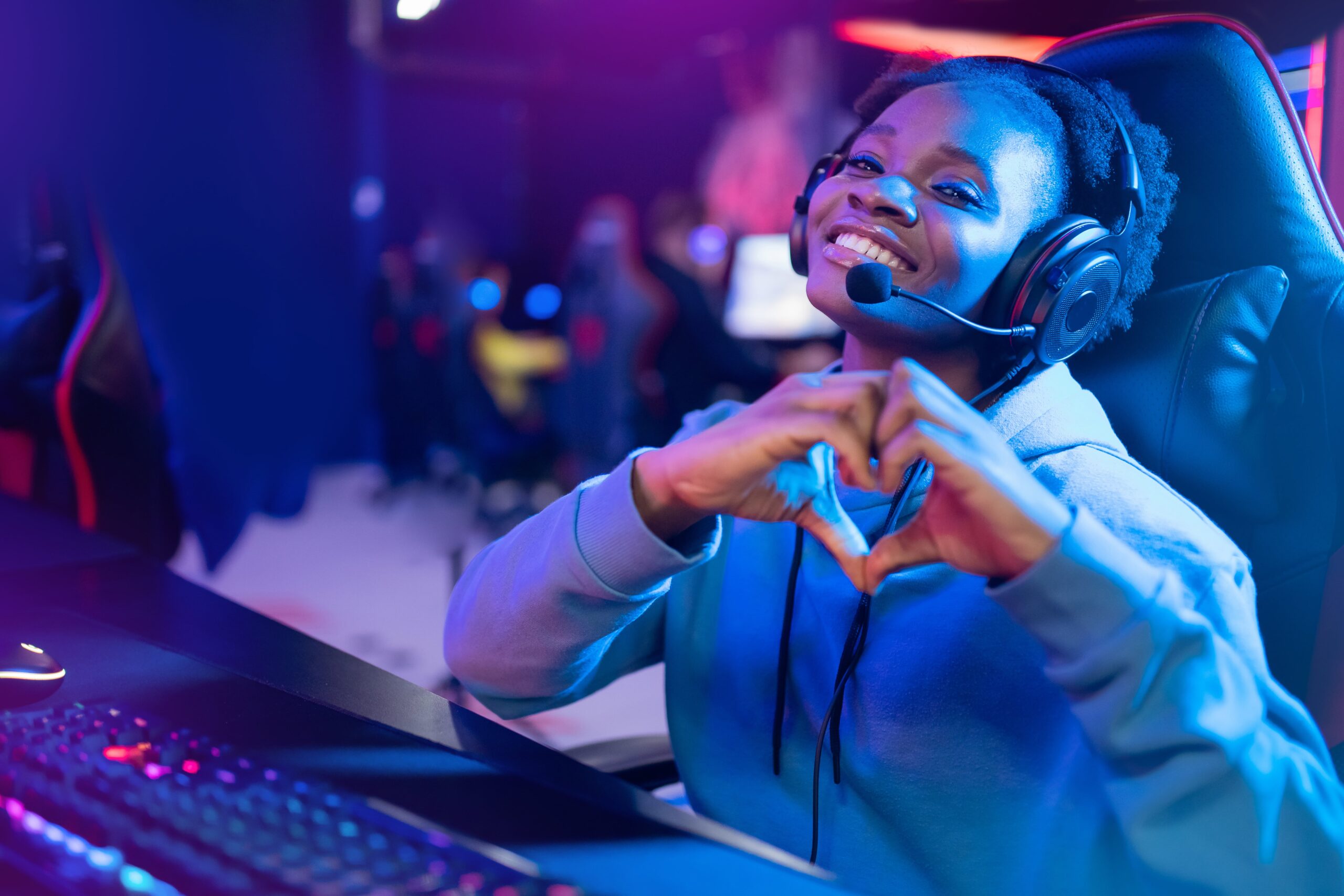 happy female player support, live service gaming